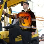 hi-vis-hoodie-reflective-tapes-black-orange-gradient-neon-viking-591ad.webp