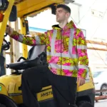 hi-vis-zip-hoodie-reflective-tapes-pink-neon-and-lime-flowers-custom-8877f.webp